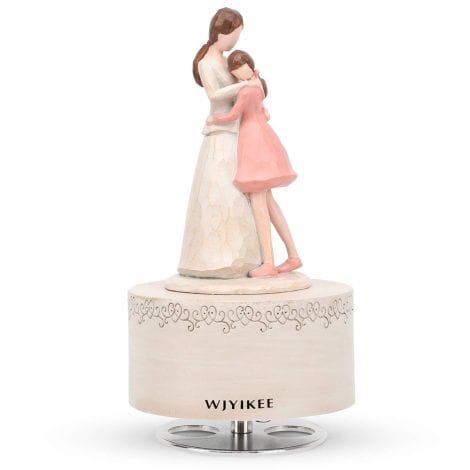 Carillon scolpito a mano, dipinto con calda e romantica figura musicale. Ideale per regalo di compleanno.